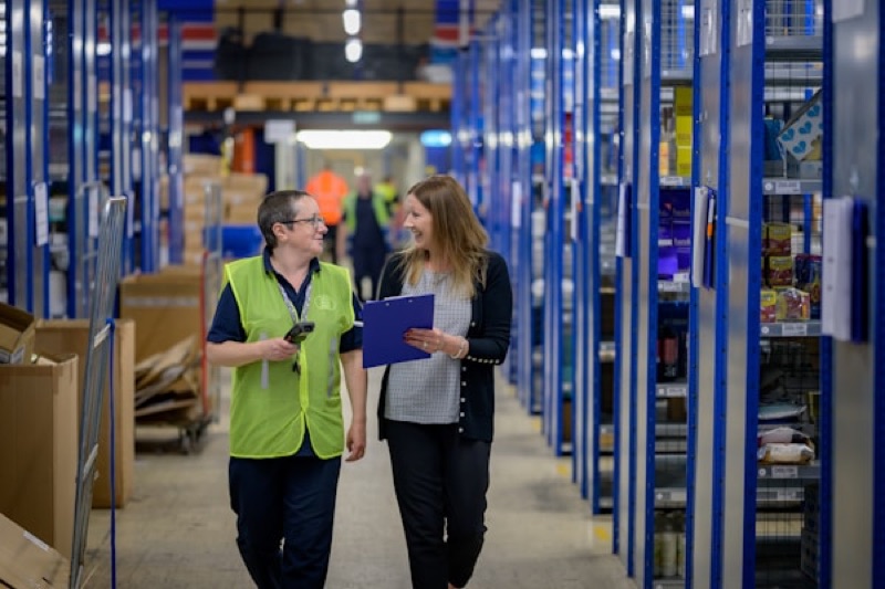 Warehouse staff reviewing stock